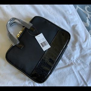 Black iPad carry case with double handles. Has a pocket inside. New .